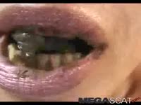 Shit Tube -  Asian bitch gets teeth coated with crap